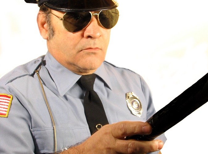 bigstock-Serious-Cop-337689-675x500.jpg